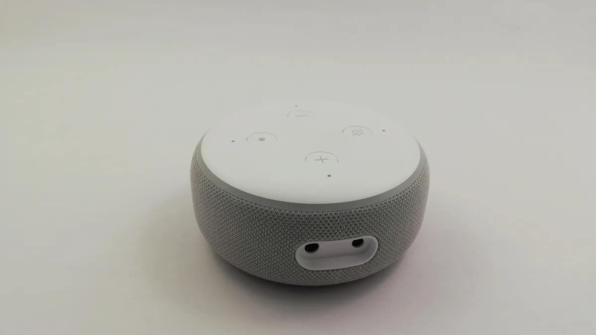 Smart speaker on a shelf in a living room