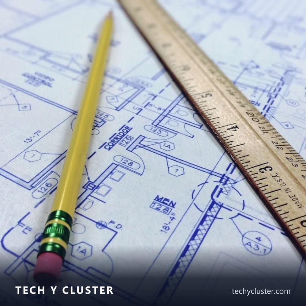 Pencil and ruler on engineering blueprints