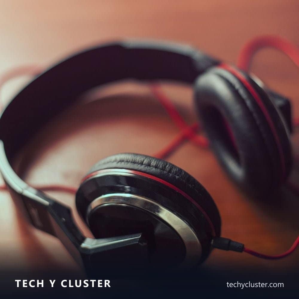 Over-ear headphones on a wooden table