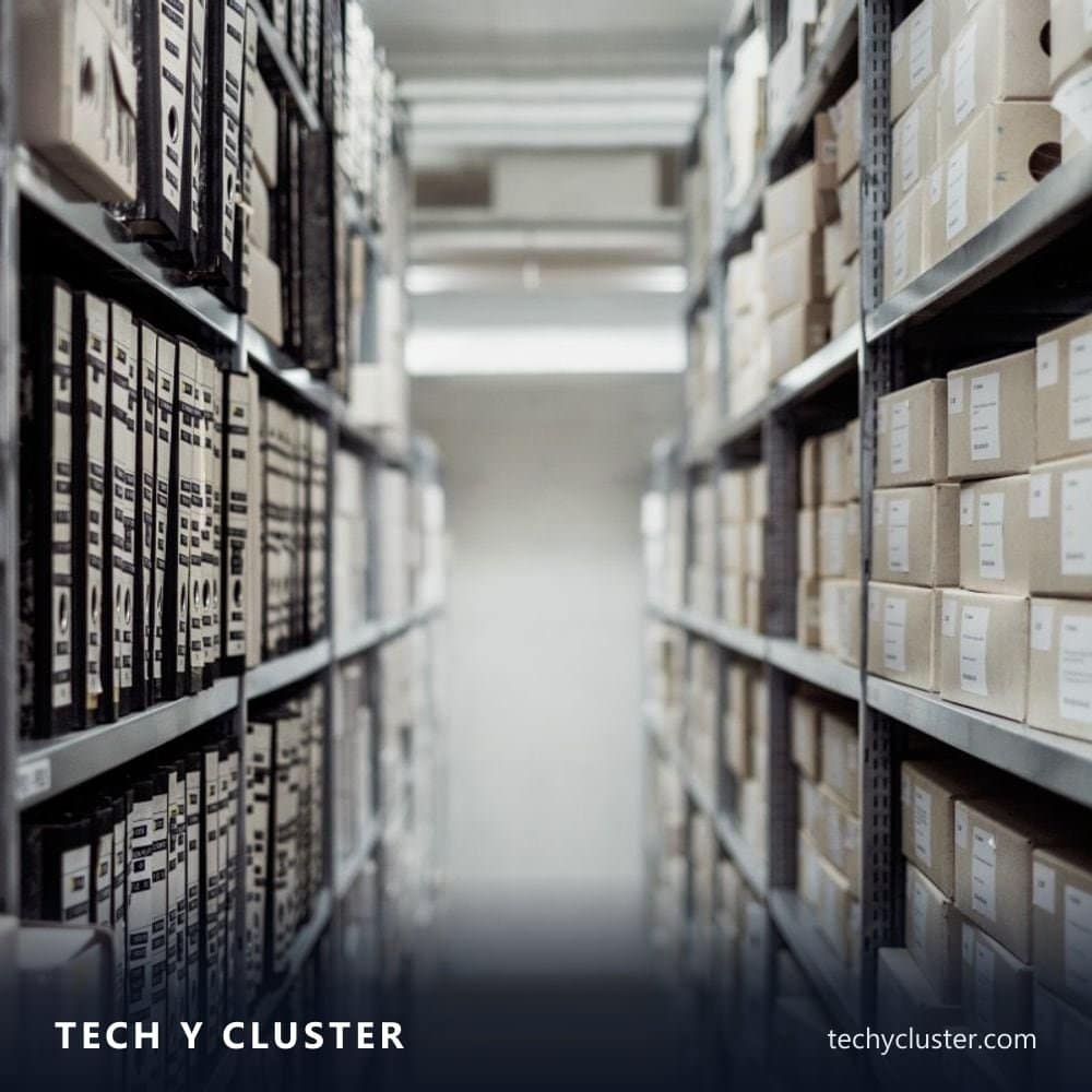 Aisle of archive shelves filled with boxes of documents